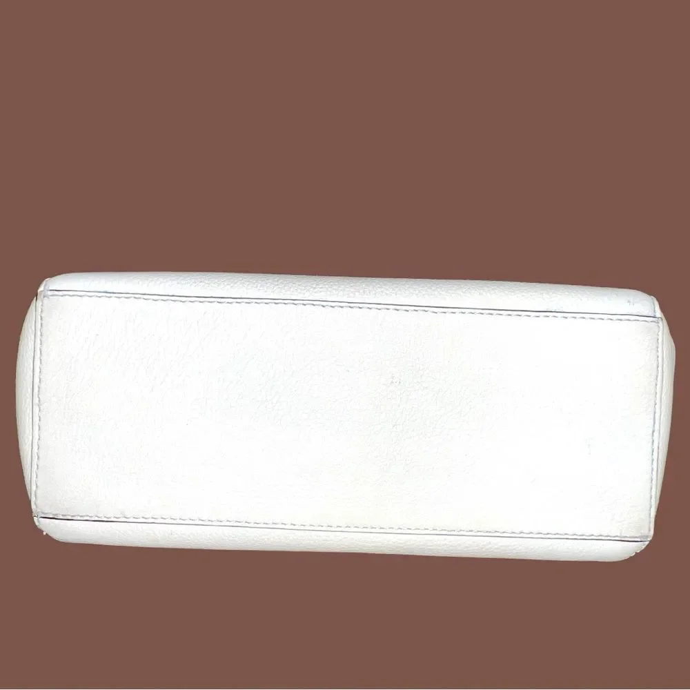 Kate Spade envelope purse. Cream with brown trim . Euc!